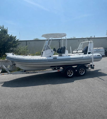 Electric inflatable boat on trailer